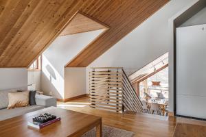 a living room with a couch and a table at Åre's best family home in Åre