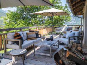 Ein Sitzbereich in der Unterkunft Superbe ferme rénovée en chalet de luxe en PLEINE NATURE