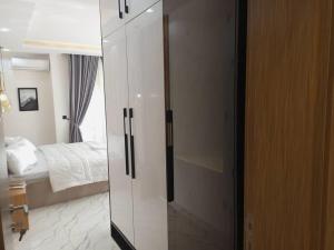 A bed or beds in a room at The Vistana Riverside 2Bedroom Apartment