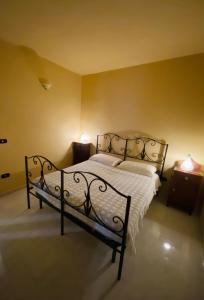 Ein Bett oder Betten in einem Zimmer der Unterkunft Mariù