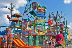 a large water park with a roller coaster at Fairfield Inn & Suites by Marriott Dallas Plano The Colony in The Colony