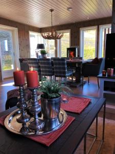 a living room with a table with candles on it at Bualie - Golsfjellet - Biking, swimmming, hiking. High standard. in Gol