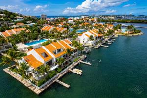 an aerial view of a resort on the water at CasaPisani Tranquil 2Bed condo SimpsonBayYachtClub in Simpson Bay