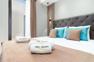Krevet ili kreveti u jedinici u okviru objekta Trio Resort