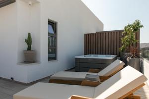 Posedenie v ubytovaní AGRELLI Hotel & Suites