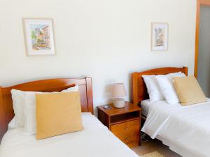 OCEAN VIEW VILLA BELAMARにあるベッド