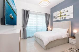Fotografie z fotogalerie ubytování Urban Caves - Stylish Condo Near Marina Walk With City Views v Dubaji