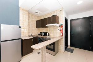 Fotografie z fotogalerie ubytování Urban Caves - Stylish Condo Near Marina Walk With City Views v Dubaji