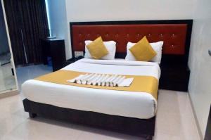 Postel nebo postele na pokoji v ubytování THE BEST HOTEL MUMBAI
