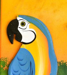 a painting of a peacock on a wall at Pousada Nossa Senhora da Guia in Nobres