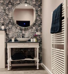 a bathroom with a sink and a mirror at B & B Diever in Diever +9 photos