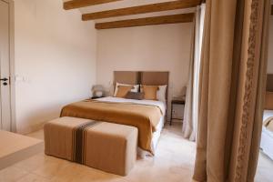 Postel nebo postele na pokoji v ubytování Casa Aura Hotel