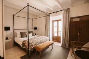 Postel nebo postele na pokoji v ubytování Casa Aura Hotel