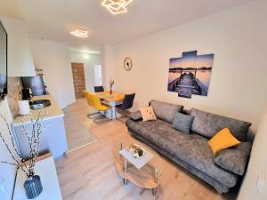 a living room with a couch and a table at Julia in Biograd na Moru
