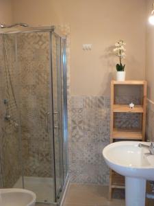 a bathroom with a shower and a sink at Cerasella B&B in Naples +26 photos