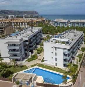 Výhled na bazén z ubytování Arenal Dream Seaside Penthouse nebo okolí