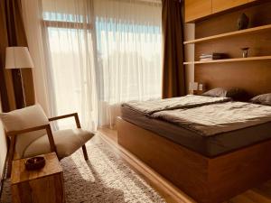 Posteľ alebo postele v izbe v ubytovaní Šumavský apartmán - Nový komfortní a prostorný, se zahradou + 28 fotografií