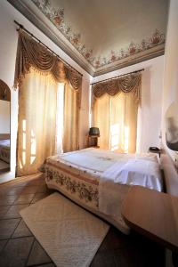 Postel nebo postele na pokoji v ubytování Hotel Iris