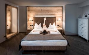 Postel nebo postele na pokoji v ubytování Hotel La Perla
