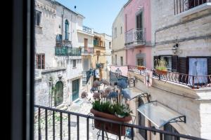 a view from a balcony of an alley with buildings at Il Borgo Antico B & B in Capurso