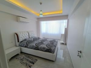 Postel nebo postele na pokoji v ubytování Flat For Rent At The City Center Of Kuşadası