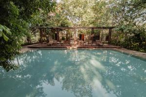 Bazén v ubytování Hacienda Shambalante nebo v jeho okolí