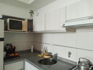 Kjøkken eller kjøkkenkrok på TEMPORARIO CARRASCO