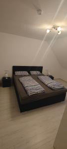 Кровать или кровати в номере Urlaub am Rhein
