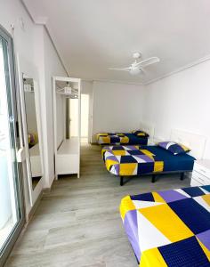 Cama o camas de una habitación en Centro Apartamentos