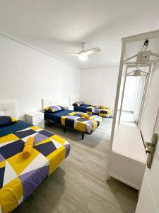 Cama o camas de una habitación en Centro Apartamentos