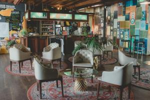 a group of chairs and tables in a store at Indian Ocean Hotel in Perth