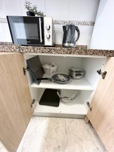 Una cocina o zona de cocina en Centro Apartamentos
