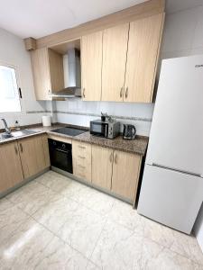Una cocina o zona de cocina en Centro Apartamentos