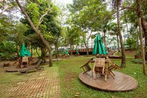 Taman di luar Thermas Paradise - Rio Quente - Apto 2 quartos com Suíte