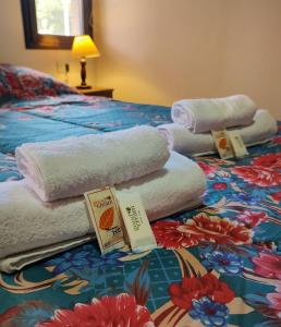 Postel nebo postele na pokoji v ubytování La Trinidad Complejo de Cabañas C1
