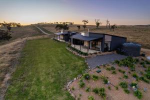 an aerial view of a house in the middle of a field at Old Bull Creek Luxury Retreat in Strathalbyn