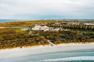 an aerial view of a resort on a beach at Deep Blue Hotel & Hot Springs in Warrnambool
