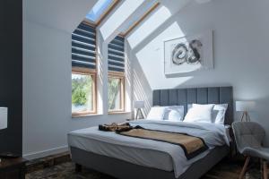 Apartamenty Klifowa 7客房内的一张或多张床位