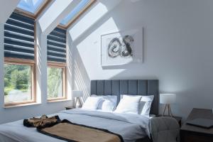 Apartamenty Klifowa 7客房内的一张或多张床位