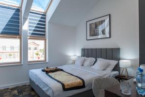 Apartamenty Klifowa 7客房内的一张或多张床位