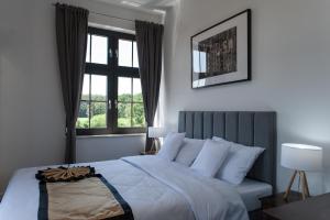 Apartamenty Klifowa 7客房内的一张或多张床位