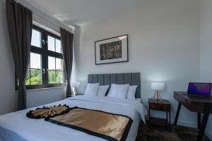 Apartamenty Klifowa 7客房内的一张或多张床位
