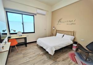 Postel nebo postele na pokoji v ubytování Sofa Potato Homestay