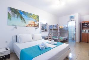 Llit o llits en una habitació de Studios Liolios #2
