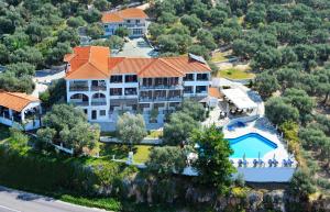 an aerial view of a large house with a swimming pool at Hotel Villa Natassa in Skala Rachoniou
