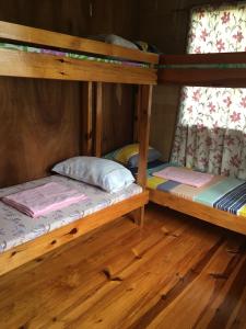 Postel nebo postele na pokoji v ubytování Vilma's Homestay