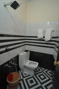 Kylpyhuone majoituspaikassa Swastika Homes