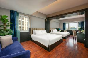 Postel nebo postele na pokoji v ubytování Ja Cosmo Hotel and Spa + 26 fotografií