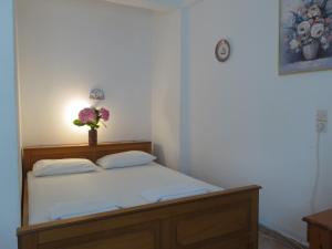 Postel nebo postele na pokoji v ubytování Panagiotis Apostoloudias Rooms