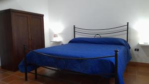 A bed or beds in a room at Villa Mattia Még 16 kép